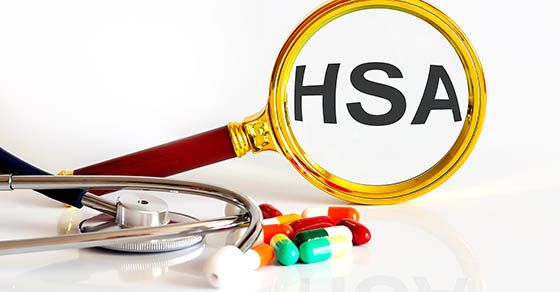 Health Savings Accounts: magnifying glass with HSA